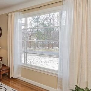 4 curtain panels, 2 cream and 2 sheer